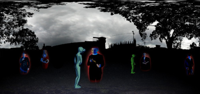 Panoramic view of Pentridge Prison at night time. There are holograms of priests and figures wearing VR goggles in the foreground. 