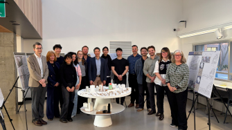 Prof. Phil Oldfield (far left), Landcom CEO Alexander Wesler and Masters students.