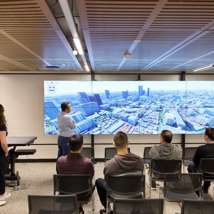 Students using technology in the City Futures Lab at the School of Built Environment
