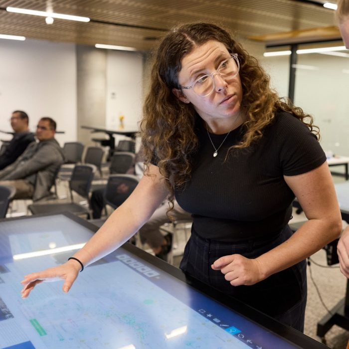 Students using technology in the City Futures Lab at the School of Built Environment