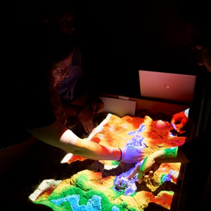 Students using technology in the City Futures Lab at the School of Built Environment