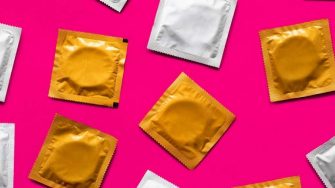 Condoms In Pink Background