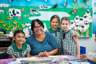 Aunty Maxine Ryan, Cultural Resident in Sydney, works with children in the classroom. 
