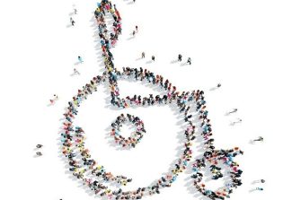 Crowd of people forming a wheelchair symbol
