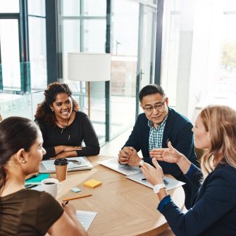 Shot of a group of businesspeople having a meeting in an office