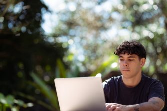 Image of UNSW Indigenous student on a laptop