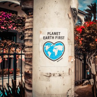 Photo board saying planet earth first