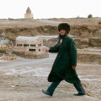A Turkman Sheik walking towards a holy shrine Köneürgench Turkmanistan