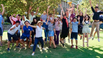 a group of students jumping