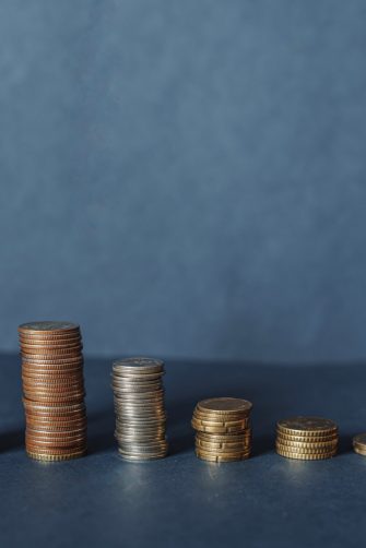 Elderly people sitting on coin, Time counting down for retirement concept, social security income and pensions, Money saving and Investment, Financial stability in retirement