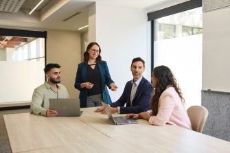 AGSM students working together in a classroom on campus