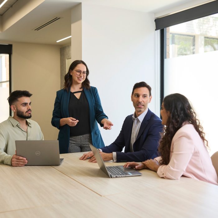 AGSM students working together in a classroom on campus