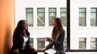 Two women chatting