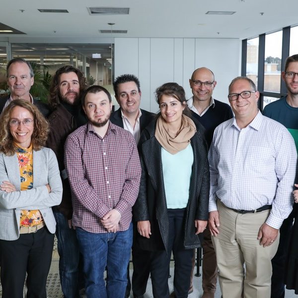 Group portrait of the STEP UP research team and attendees at the UNSW Business School STEP UP 2019 conference.