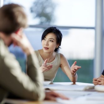 Business people talking in meeting - stock photo