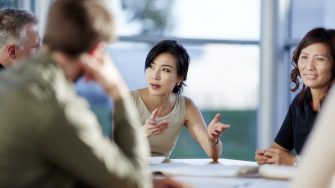 Business people talking in meeting - stock photo