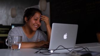 Woman using a Macbook