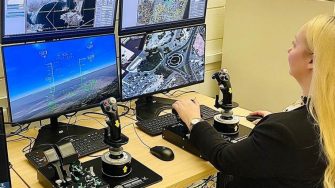 Oleksandra Molloy using the aviator training simulator