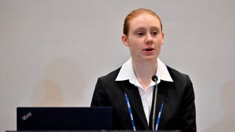 Georgia Warren presenting on aeronautics in Orlando, Florida.