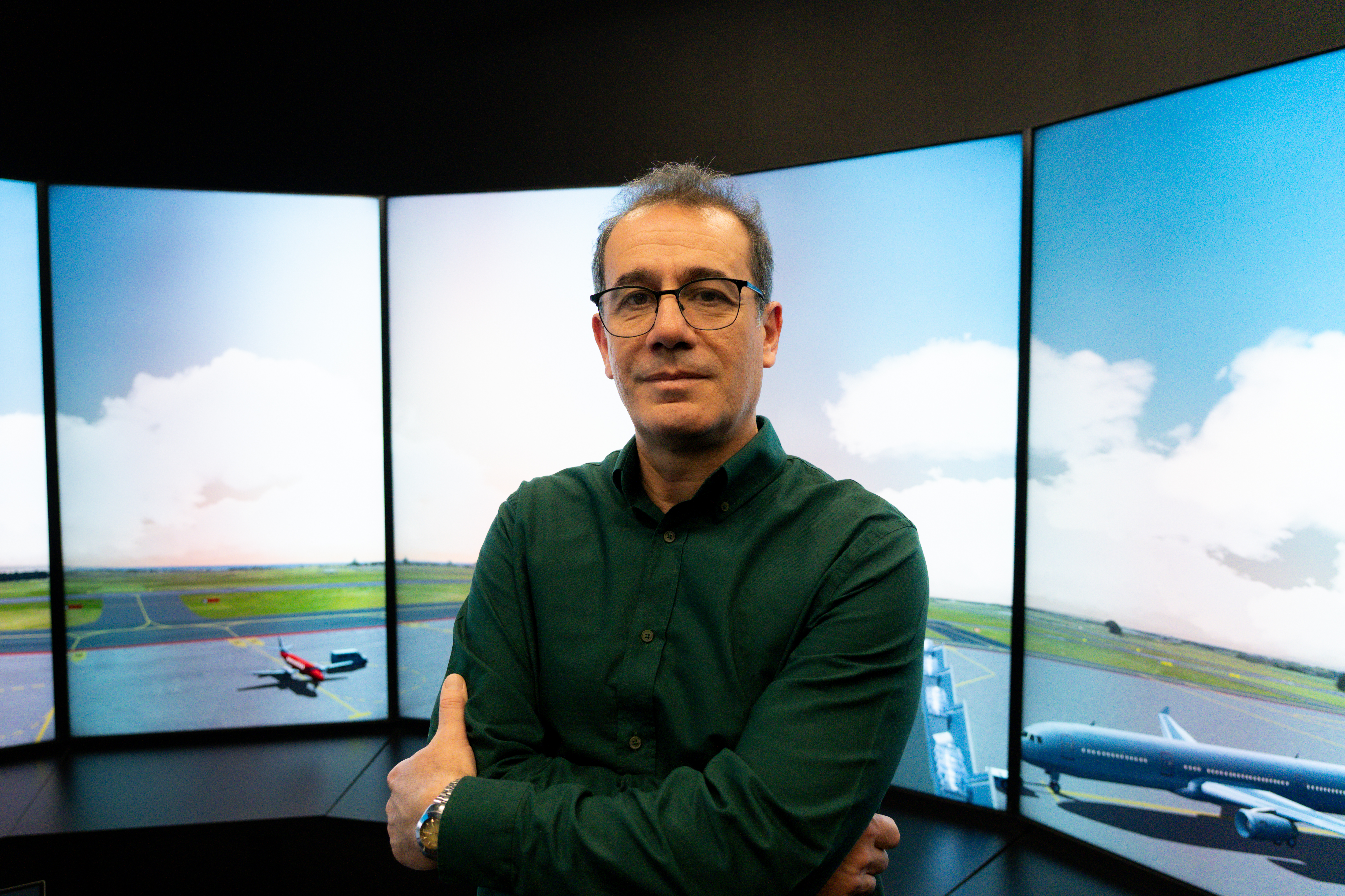 Dr Ugur Turhan in the Air Traffic Control Lab at UNSW Canberra