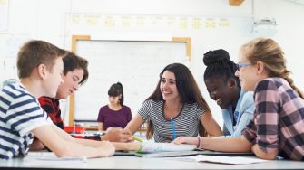 Tutor with students