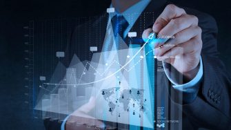 businessman hand working with new modern computer and business strategy as concept