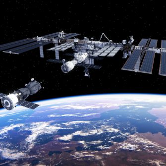 Spacecraft Docked To International Space Station. 3D Illustration.