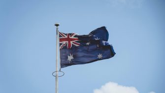 Australia flag raised on pole 