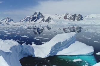 Close up melting iceberg on waters of Southern Ocean to ice-shelves