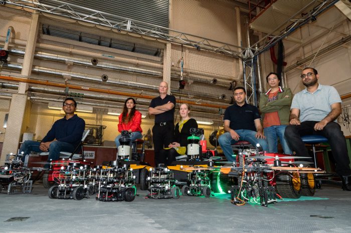 Robotic Engineers photographed in the robotics lab in Building 18 on campus.L to R: Dr Asanka Perera, Dr Shadi Abpeikar, Prof Matt Garratt, Prof Kathryn Kasmarik, Dr Essam Debie, Dr Phi (Vu) Tran, Mr Ammar Mahdi (PhD Candidate)