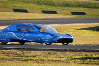 The Sunswift 8 racing car being driven on a test track
