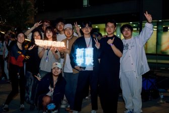 A group of UNSW students posing with a CSA sign
