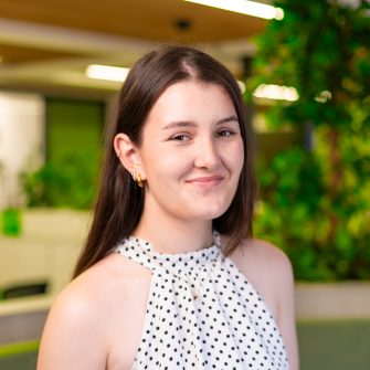 A professional headshot of Madeline Kahl