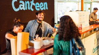 UNSW students lining up for food at the Canteen