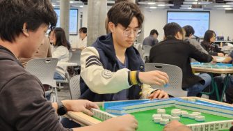 UNSW students participating in a mahjong tournament