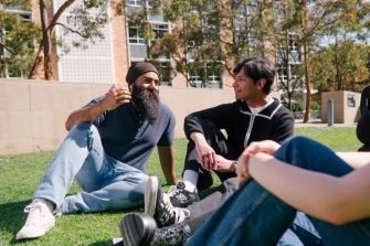 Group of students hanging out on university campus