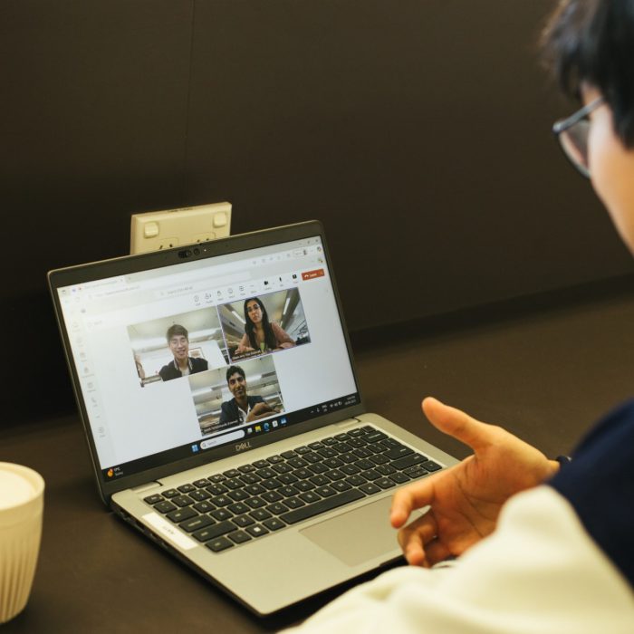Student on a teams video call on their laptop