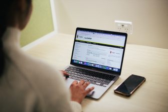 Photo of a student accessing myUNSW on their laptop