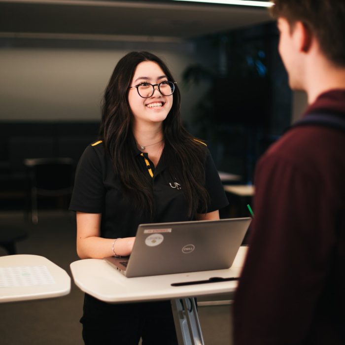 Student speaking to a concierge at The Nucleus: Student Hub