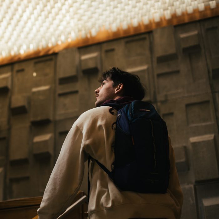 Student walking up stairs on campus