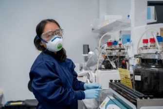 Dr Lan Wu in the UNSW labs, testing biology-based conversion pathways to make turning captured carbon into higher-value outputs more cost-effective