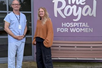 Profs Alec Welsh and Tracie Barber have won a $2.4M grant for their collaborative work on placental monitoring. They are standing outside The Royal Hospital for Women.  