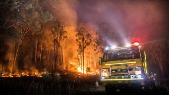 Firetruck beside a bushfire