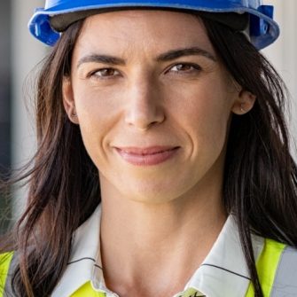 confident woman engineer at construction site