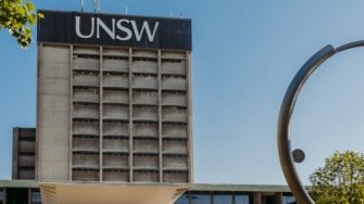 UNSW sign on top of University building