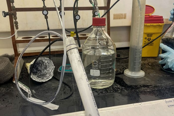Pumping the lab-grown bacteria into a custom-built cartridge designed to protect the bacteria before injection at Homebush Bay