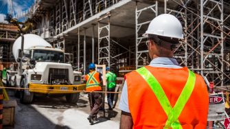  a man standing in a construction site 