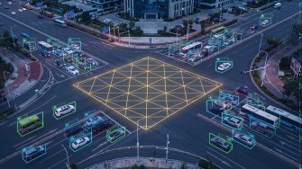 Traffic monitoring interface on city intersection with autonomous vehicle tracking, digital telemetry hud data, and smart city infrastructure (Generated with AI)