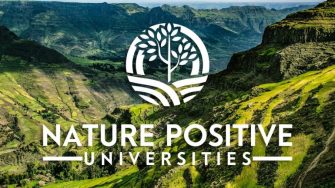 Nature Positive Universities logo over a mountain landscape.