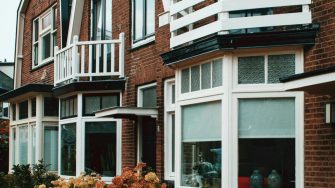 Red brick house outside view with windows